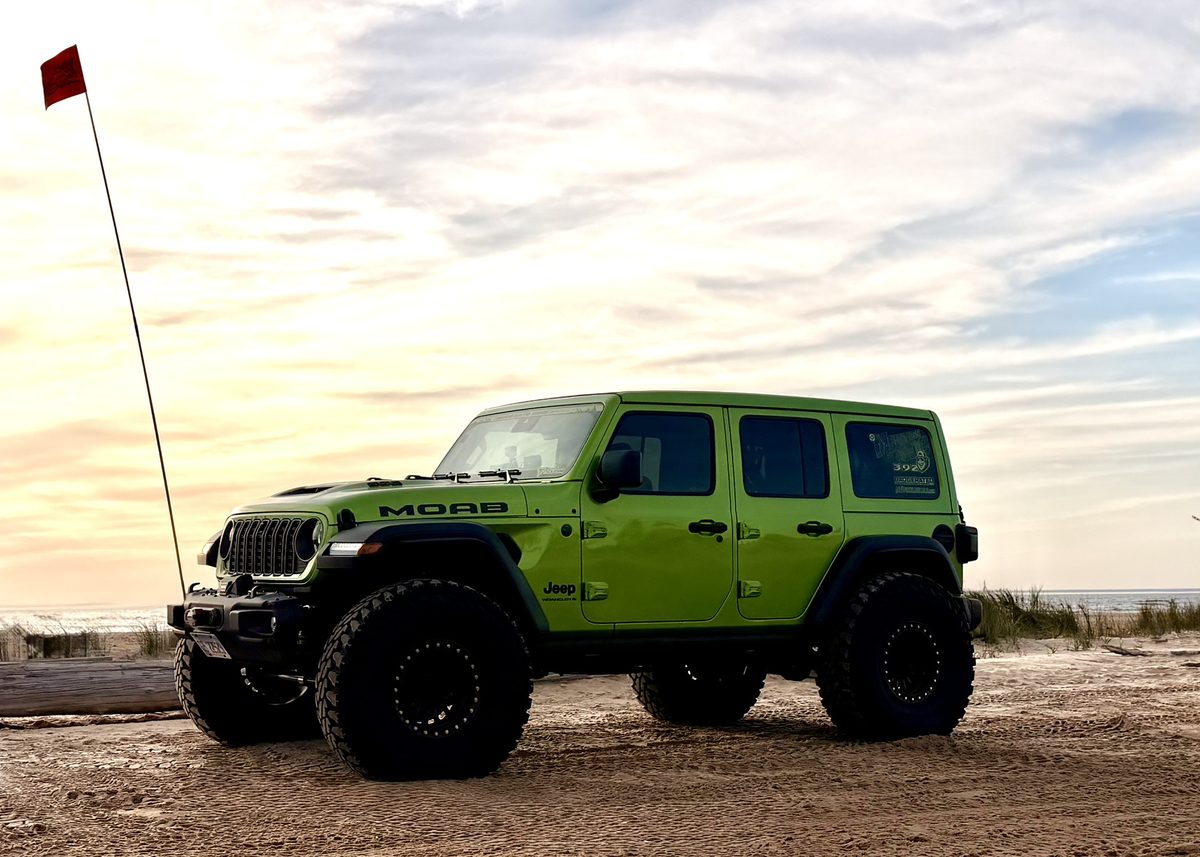 Jeep on the sand at Silver Lake Sand Dunes Jeep Invasion 2026